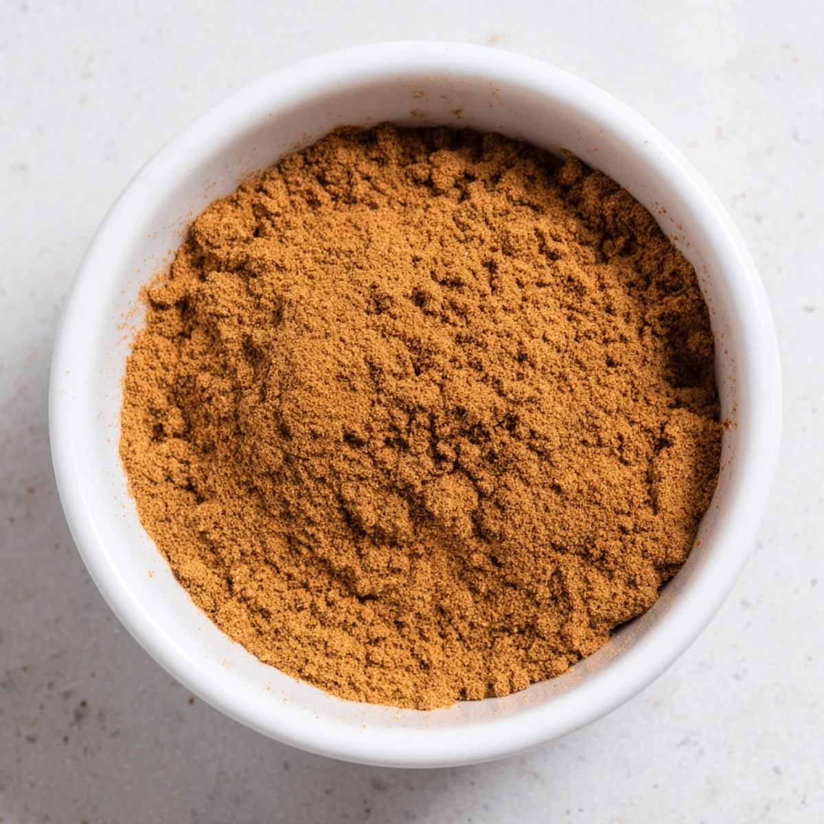 Aromatic, homemade gingerbread spice, ready to be whisked into festive gingerbread recipes.