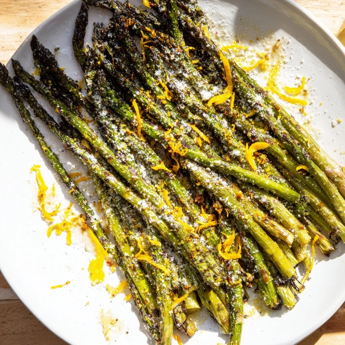 Vibrant plate of roasted asparagus with lemon, perfect for your Mediterranean-inspired dinner.