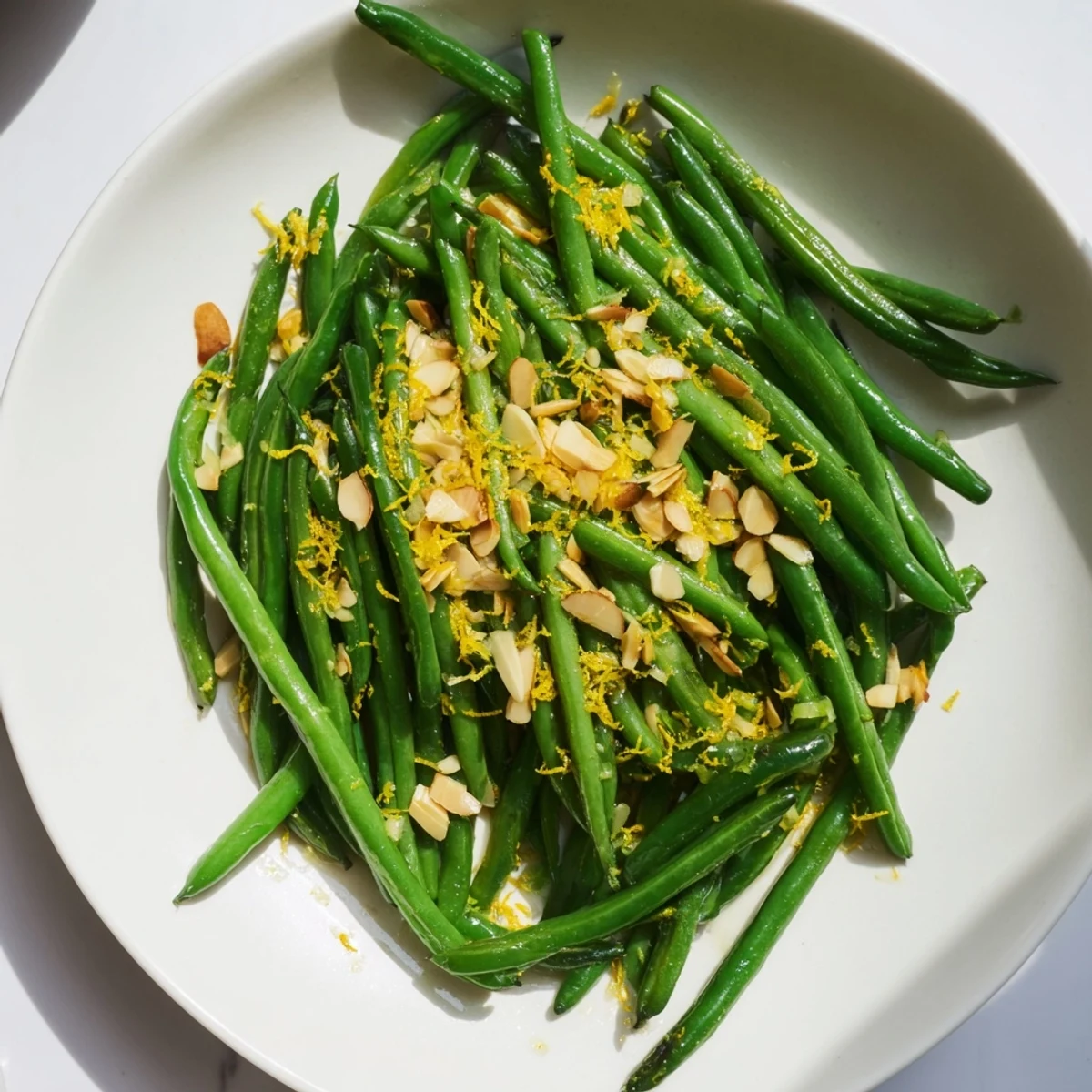 Sizzling Lemon Garlic Green Beans with Almonds, a vibrant side with toasted, fragrant almonds.