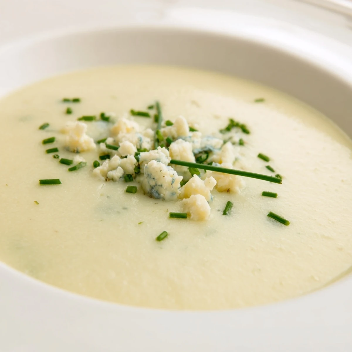 Warm and comforting bowl of Celery and Stilton Soup, perfectly blended and ready to serve with crusty bread.
