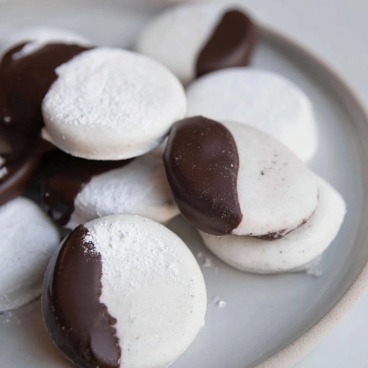 Freshly made Peppermint Creams, a sweet, pastel-colored treat, perfect for gifting this holiday season.