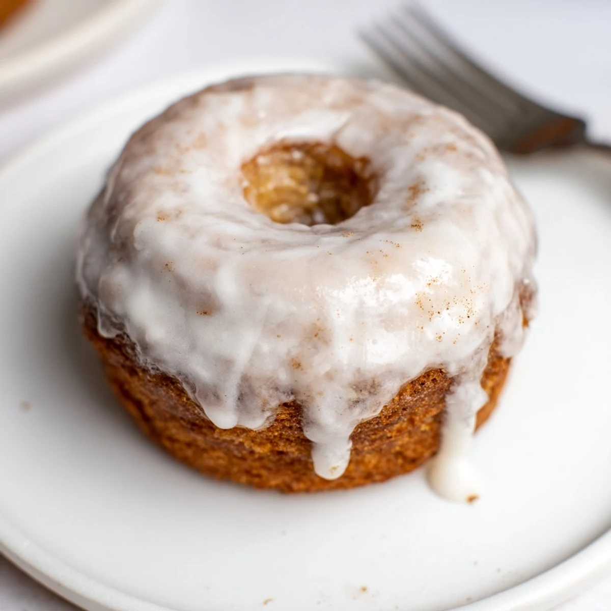 Warm Banana Donuts cooling on a wire rack, golden edges and soft centers