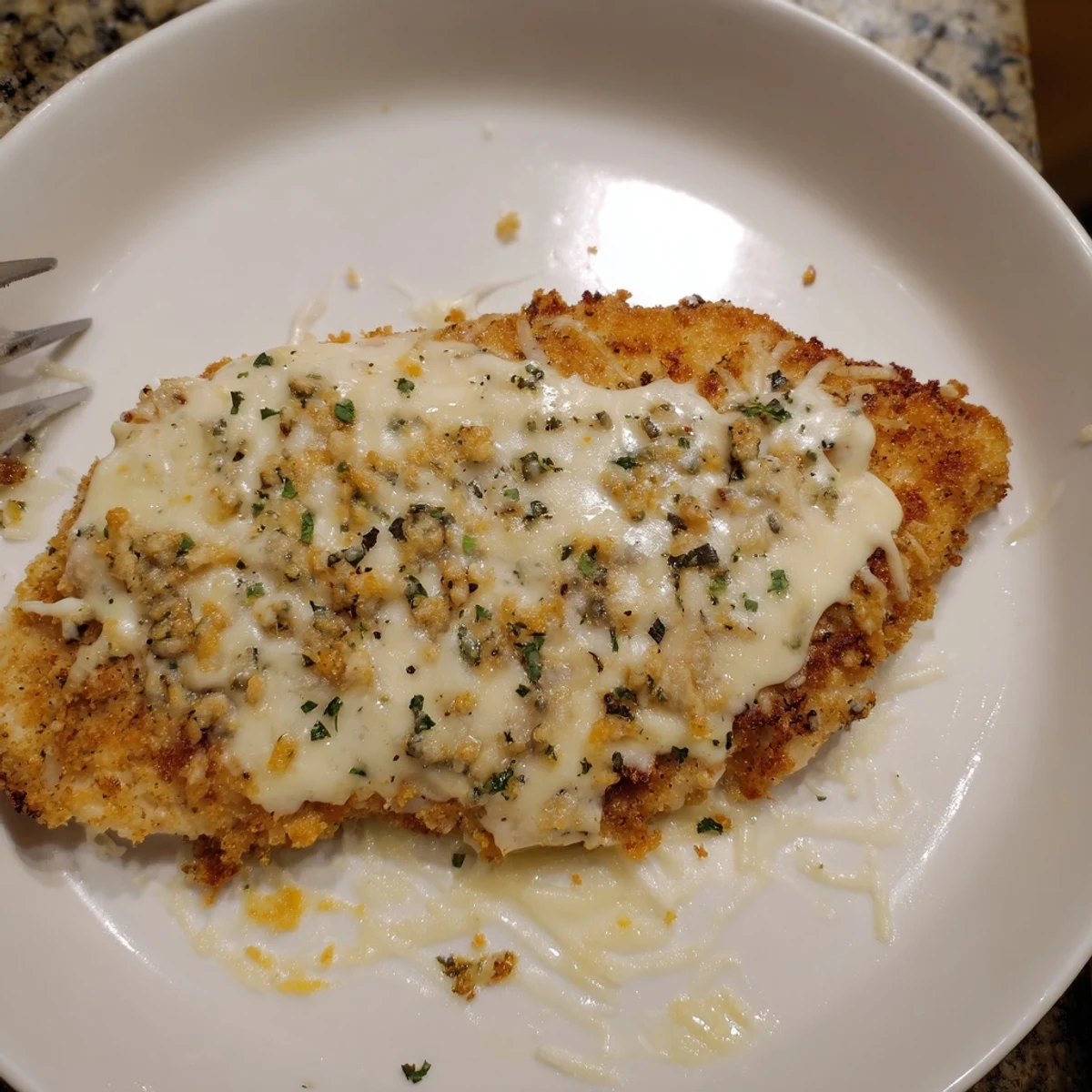 Longhorn Steakhouses Parmesan Crusted Chicken: golden bubbly crust over juicy grilled breast